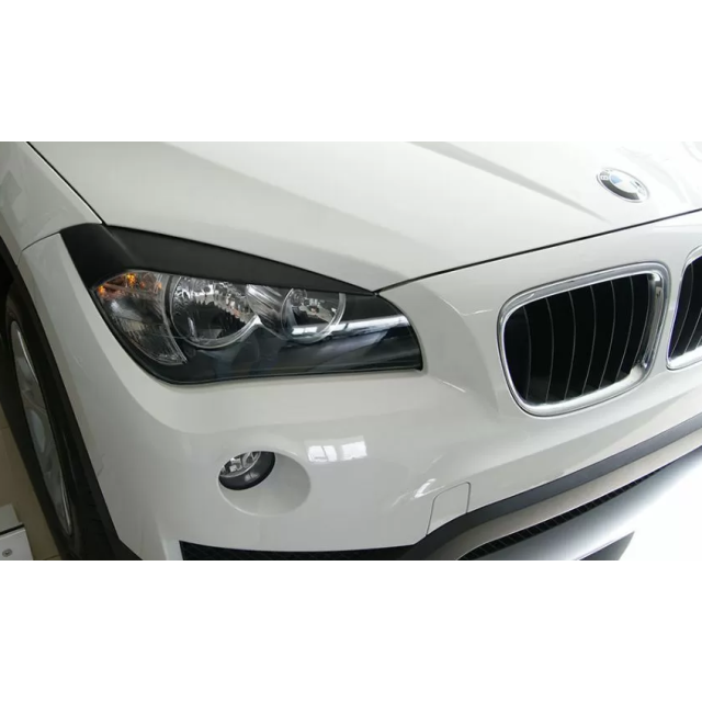 купи Вежди за фарове за BMW X1